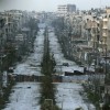 A general view shows a damaged street with sandbags used as barriers in Aleppo's Saif al-Dawla district