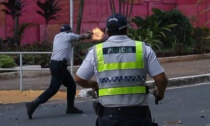 policial arma de fogo manifestação