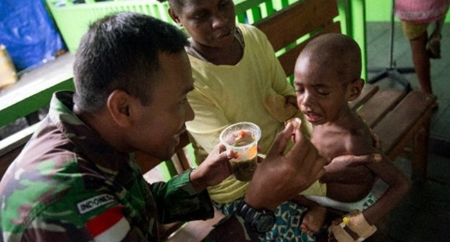 crianças morrem de fome mina de ouro