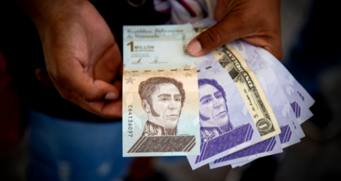 incentivar uso moeda Venezuela novo imposto transações dólar