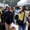 Venezuelanos começam a voltar para o país após sinais de recuperação venezuelanos-comecam-voltar-sinais-recuperacao